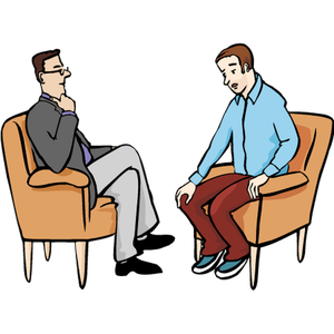 Zwei Männer sitzen sich in zwei Sesseln gegenüber und reden miteinander