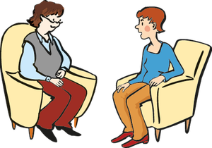 Zwei Frauen sitzen sich in Sesseln gegenüber und die eine Frau hört der anderen sehr aufmerksam zu, was diese erzählt